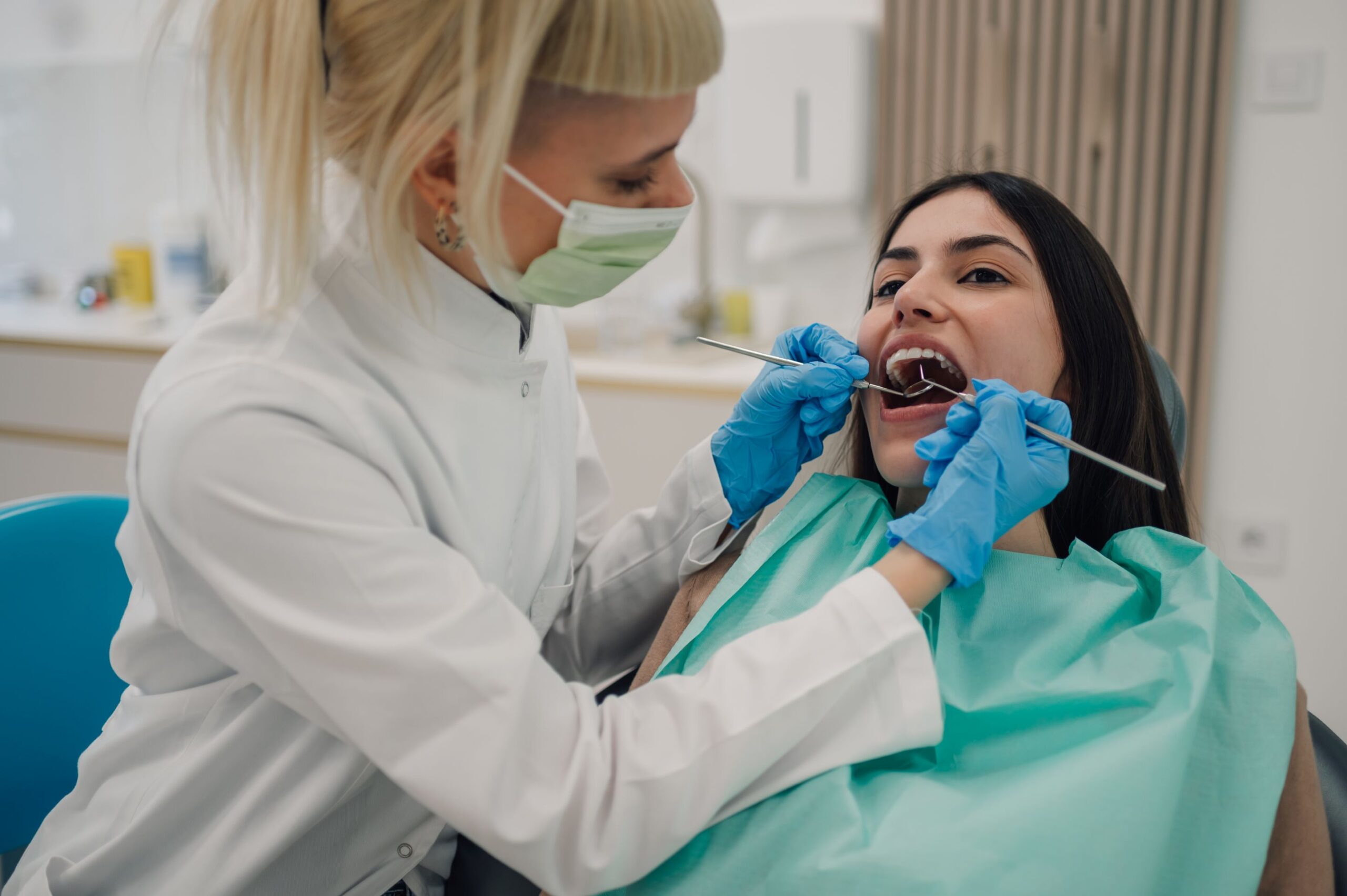 dentist examining patient's teeth